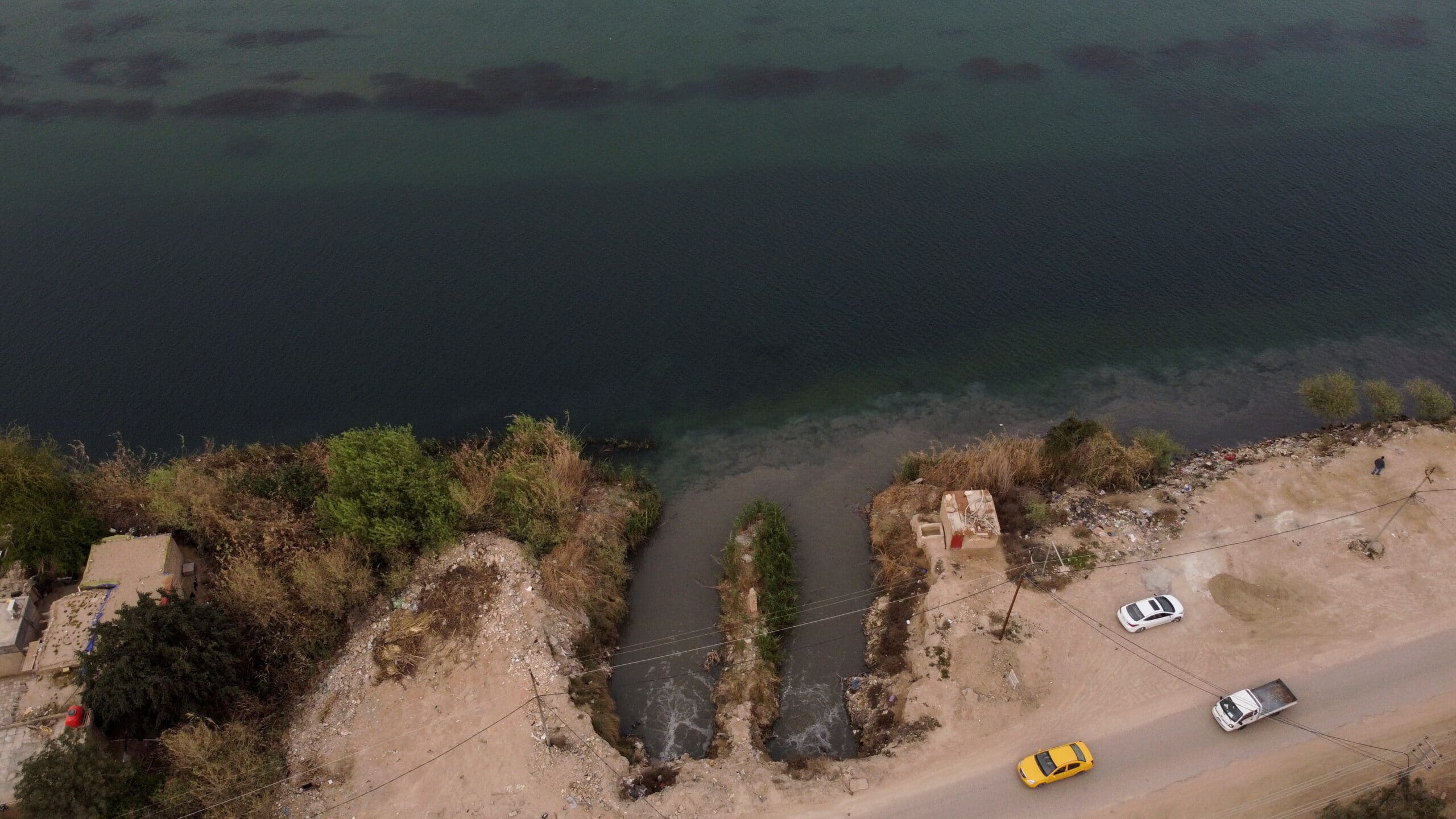 Water contaminated with raw sewage flows via open channels into the ocean at Hann Bay on the eastern edge of Dakar's peninsula. REUTERS/Zohra Bensemra