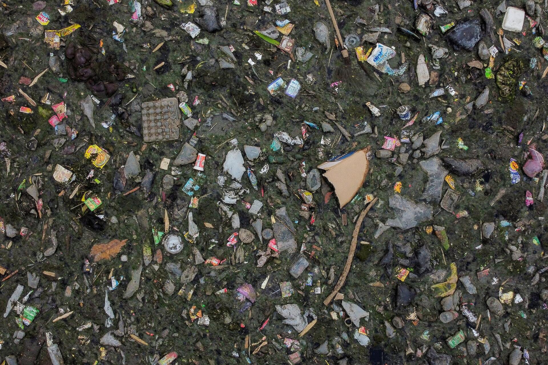 Domestic waste floats on the stream of the Citarum river in Bandung, Indonesia, March 15, 2021. REUTERS/Willy Kurniawan