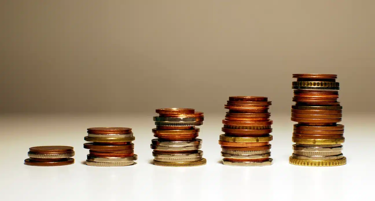 Stacks of coins increasing in height from left to right