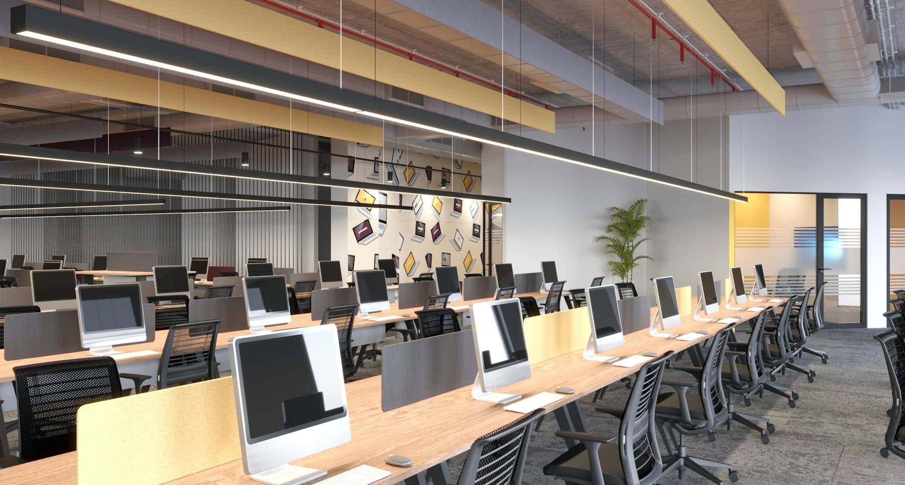 An empty open-plan office with rows of desks, chairs and computer monitors and no people